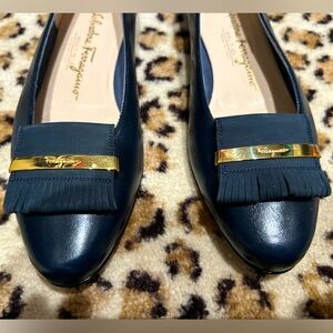 Leather navy flats by Salvatore Ferragamo in size 7. Made in Italy